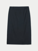 Black pencil skirt on a light gray background #color_black