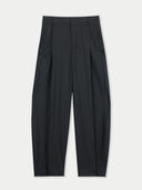 Barrel-Leg Cashmere Pants Black detail view on white background #color_black