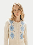 Women's White Cashmere Argyle Cardigan worn by model, detail view on white background #color_soft-white #ai-image