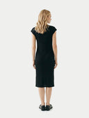 Women's Black Cashmere Tie-Neck Dress worn by model, back view on white background #color_black
