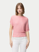 Women's Short Dolman Sleeve Cashmere Sweater Pink Icing worn by model, detail view on white background #color_icing-pink