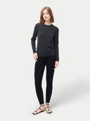 Women's Silk Cashmere Leggings Black worn by model, front view on white background #color_graphite-black