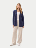 Women's Ajour Knit Open-Front Cashmere Cardigan Crown Blue worn by model, front view on white background #color_soft-indigo #ai-image