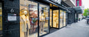 A Gobi Cashmere store on a European high street, with cashmere knitwear displayed in the windows