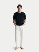 Men's Black Cashmere Silk Double-Collar T-Shirt worn by model, front view on white background #color_graphite-black #ai-image