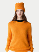 Person wearing an orange sweater and hat on a white background. #color_apricot-orange #ai-image