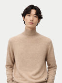 Man wearing a beige turtleneck cashmere sweater against a white background. #color_soft-beige #ai-image