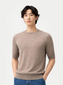 Men's Silk Cashmere Crew Neck T-Shirt Taupe worn by model, detail view on white background #color_stone-taupe #ai-image